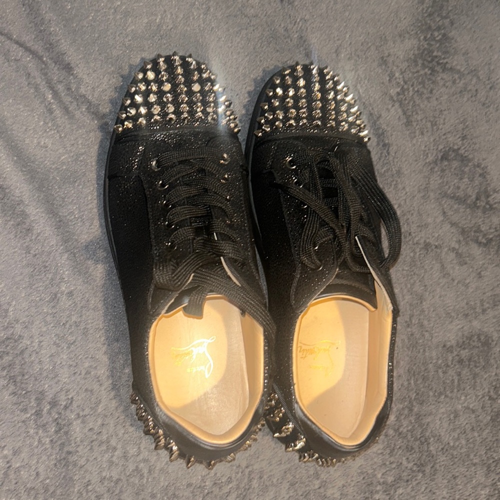 Size 43 Christian Louboutin black shoes with spikes. Worn to prom only.